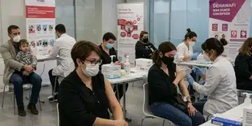 Healthcare workers administering COVID-19 vaccines to various individuals