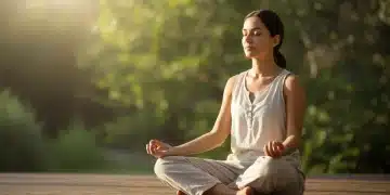 Person practicing mindfulness meditation in a peaceful setting